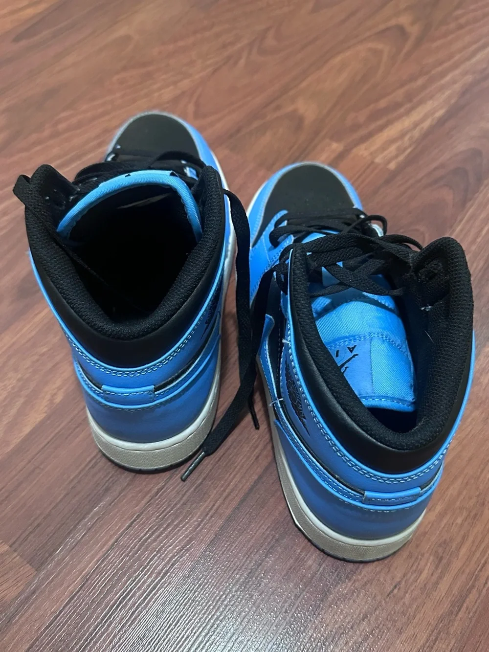 Jordan Youths Light Blue and Black High-Top Sneakers